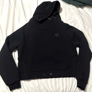 A black hoodie from womens best the bottom part is see thru